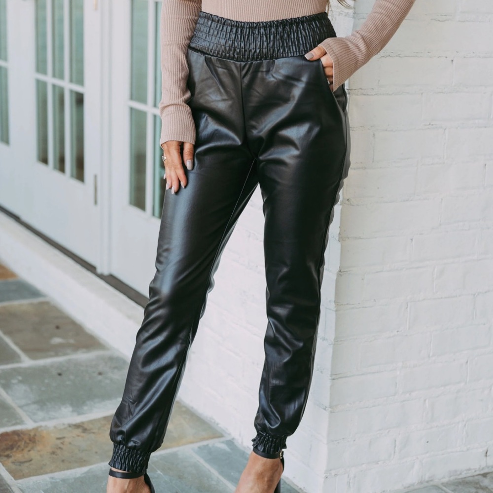Faux leather joggers by Olivaceous